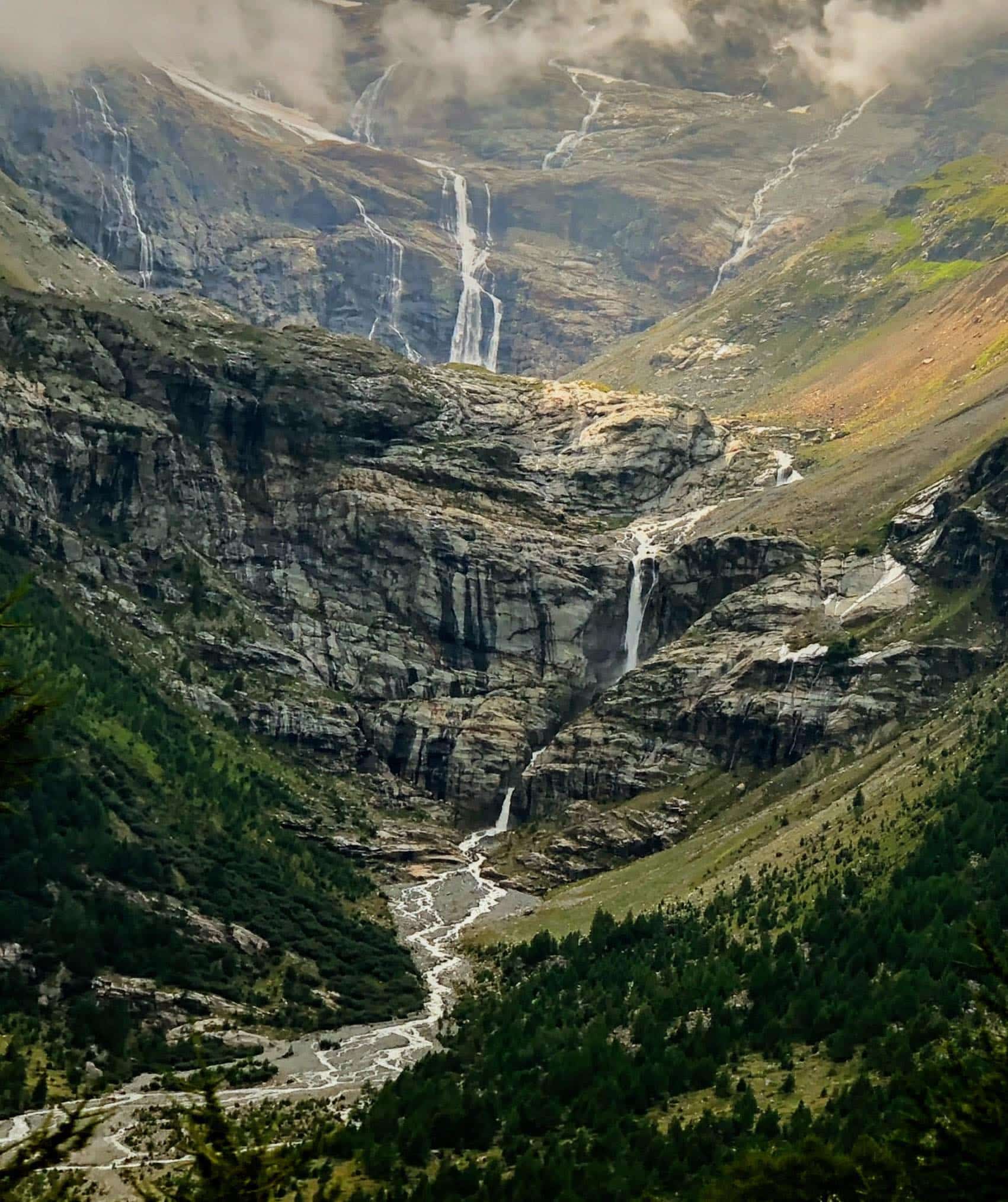 Poschiavo, Grisons, Switzerland Majestic Waterfalls flowing down the mountains